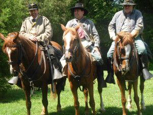 3 Civil War reenactors on horses