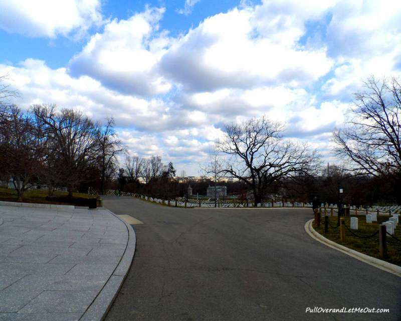 white fluffy clouds over the graves at Arlington National Cemetery PullOverAndLetMeOut