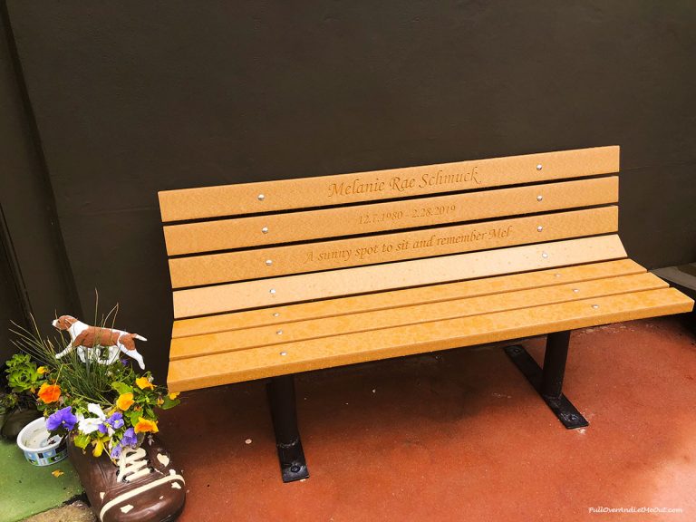 A bench in tribute to Melanie Schmuck the late co-owner of the Haines Shoe House