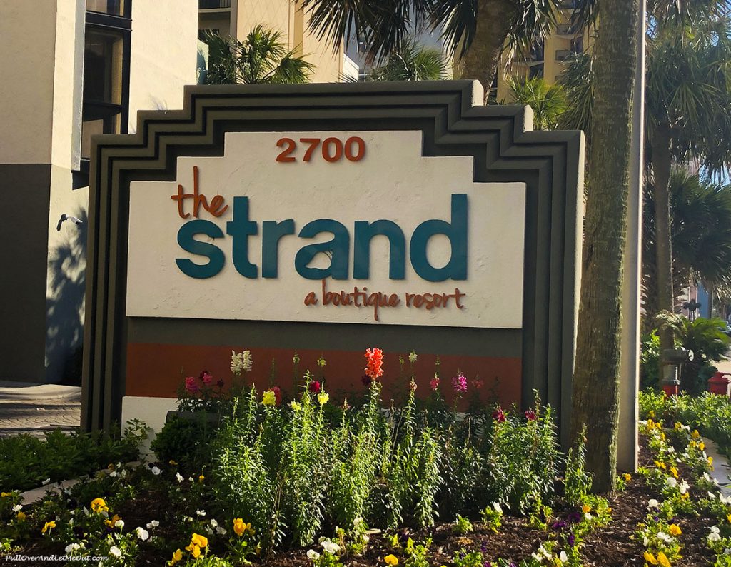 The Strand a boutique resort in Myrtle Beach, SC sign. PullOverAndLetMeOut