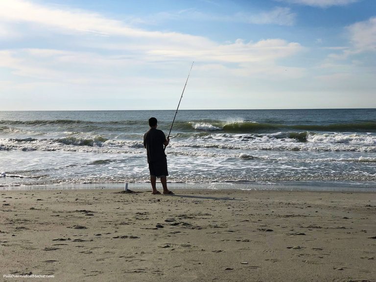 Fishing in the Atlantic on the beach outside The Strand Hotel in Myrtle Beach. PullOverAndLetMeOut