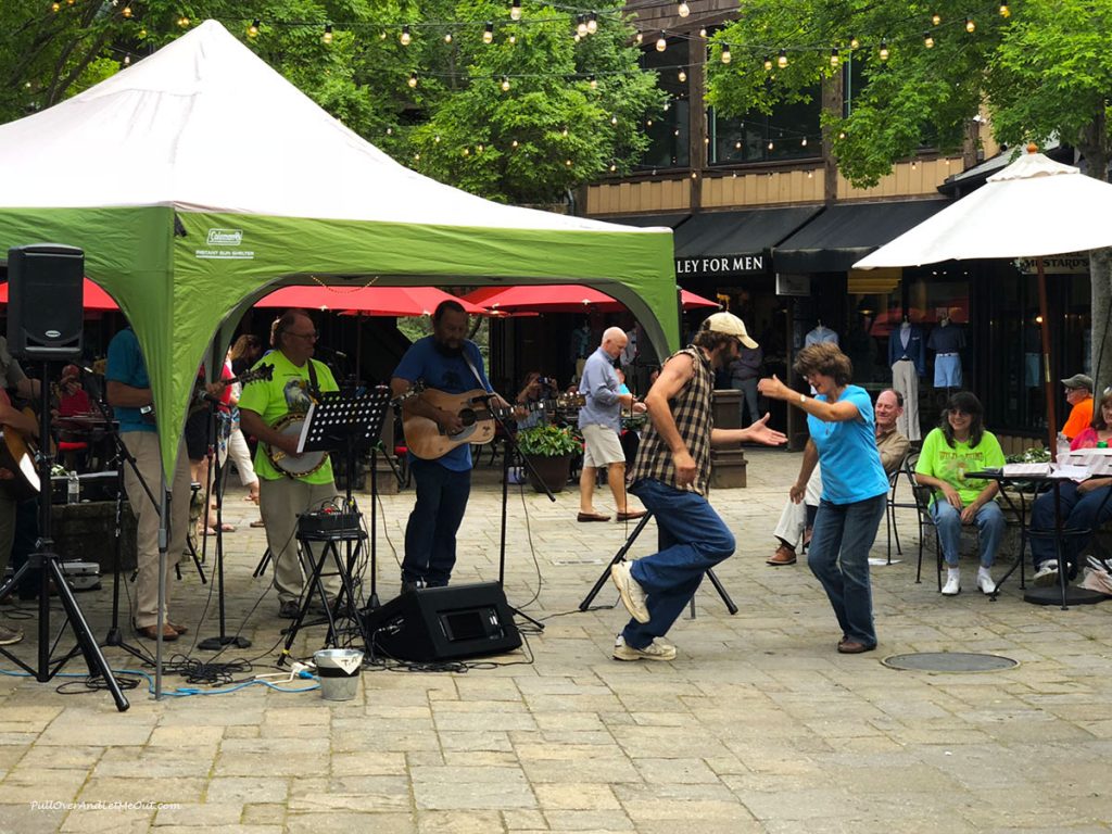 Two people dancing at a public event