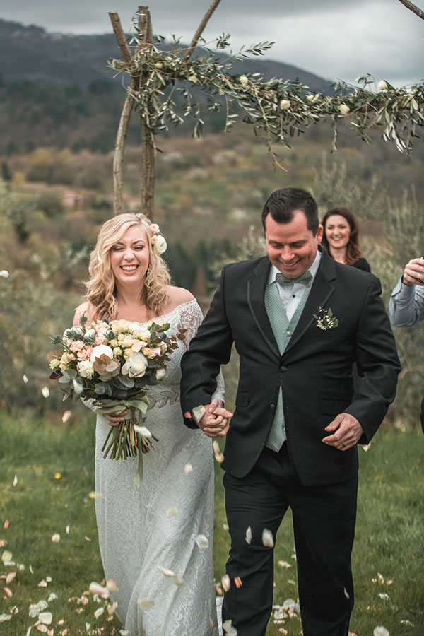 A bride and groom after the ceremony in Tuscay, Italy - PullOverAndLetMeOut