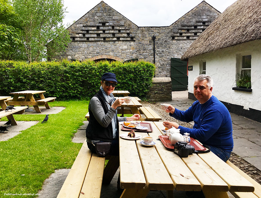 couple drinking tea and eating scones at Bunratty Castle and Folk Park