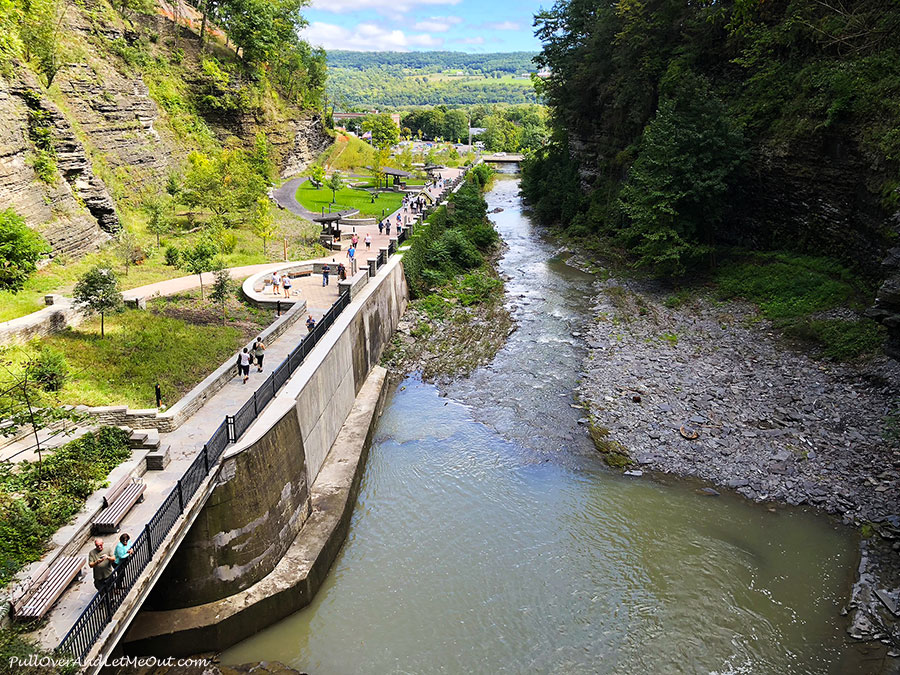 View looking down from the gorge at Watkins Glen State Park of people on walkway.