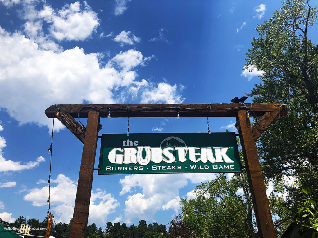 Grubsteak restaurant sign