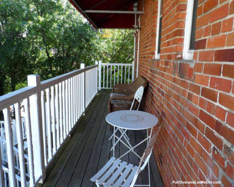 Table and chairs on a small balcony