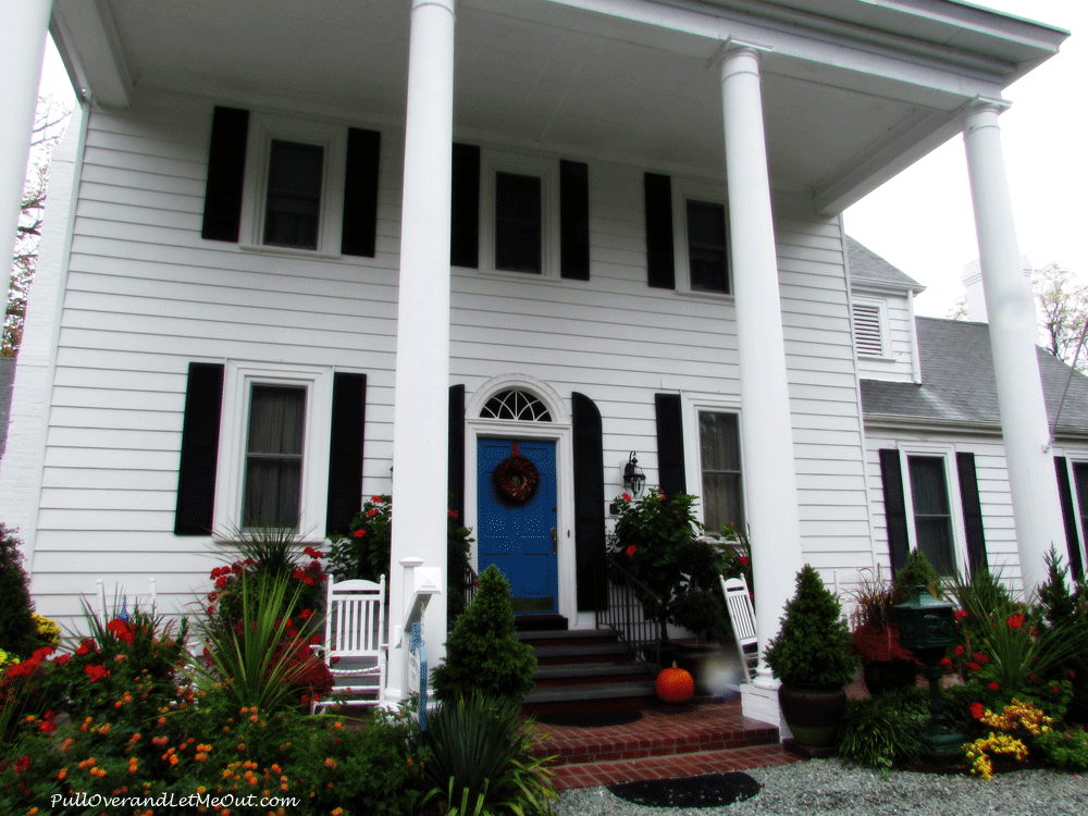 A front porch entrance with colums.