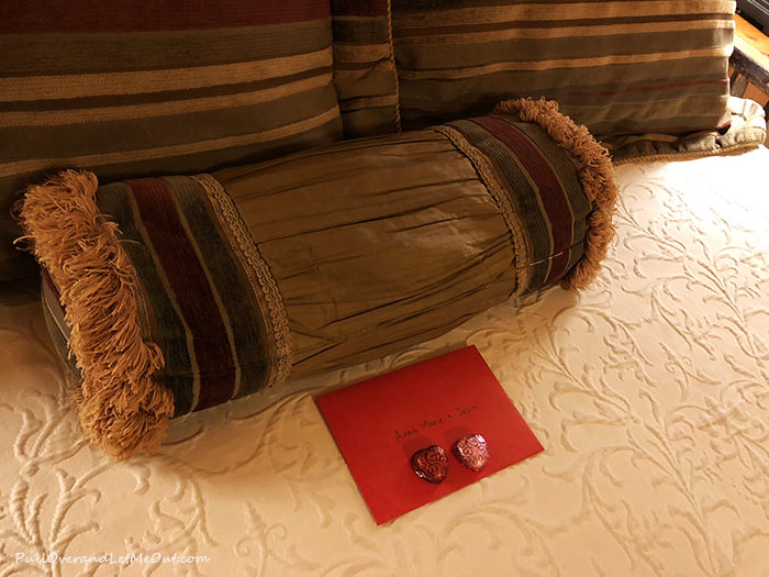 Heart shaped chocolates on a pillow