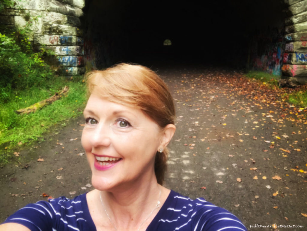 Woman taking selfie in front of a tunnel on the Road to Nowhere Bryson City, NC PullOverAndLetmeOut