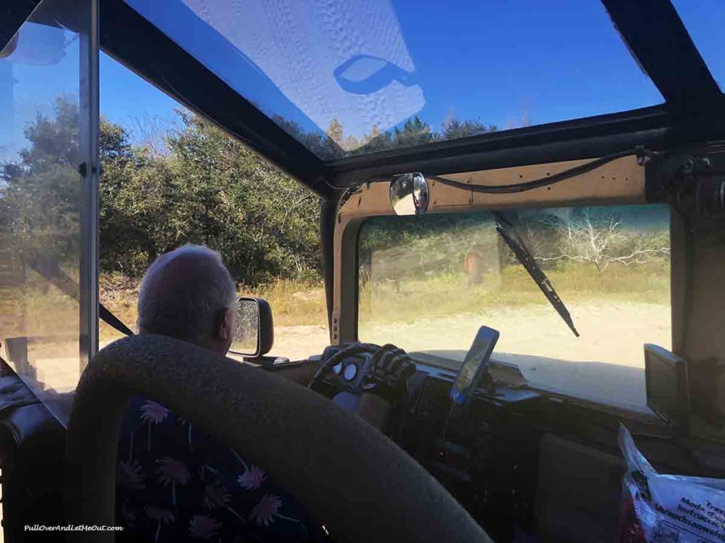 Driver of a humvee on the beach