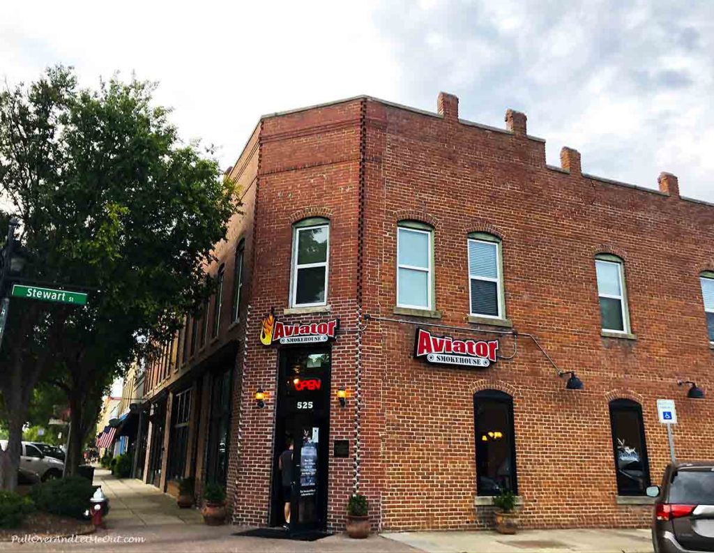 Store front of Aviator Smoke House in the old Varina Hotel in Fuquay-Varina, NC PullOverAndLetMeOut