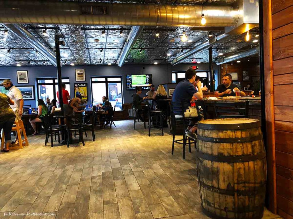 People sitting at a bar at Aviator Brewing Co. in Fuquay-Varina, NC PullOverAndLetMeOut