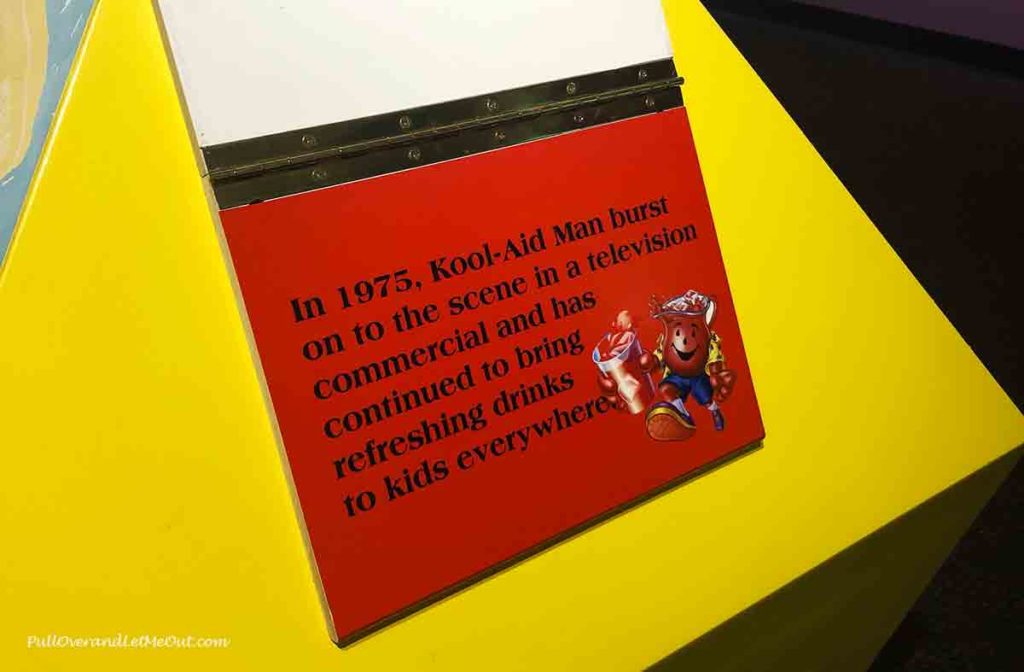 A plaque in the Kool-Aid Museum stating when the Kool-Aid Man first appeared