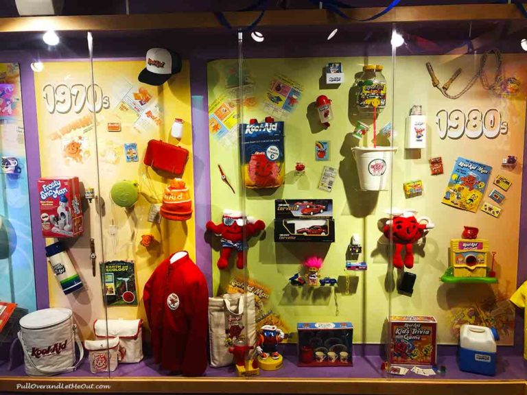 A display case with Kool-Aid swag