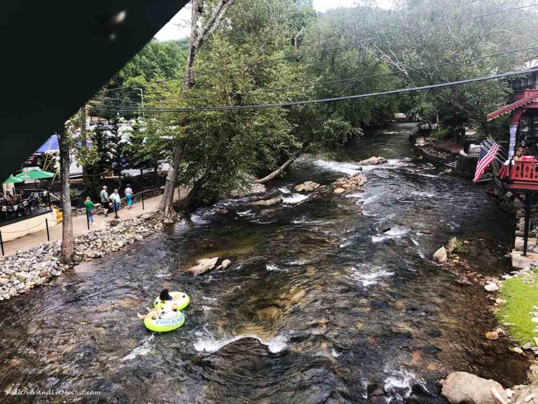 Two people riding intertubes on the Chattahoochee River in Helen, GA