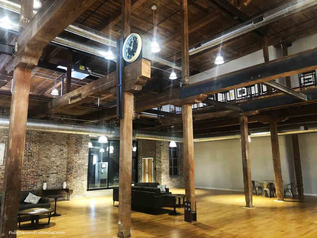 exposed wood beams inside an old cotton mill