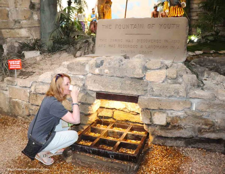 woman drinking from the fountain of youth