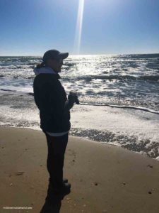 a woman in a ballcap