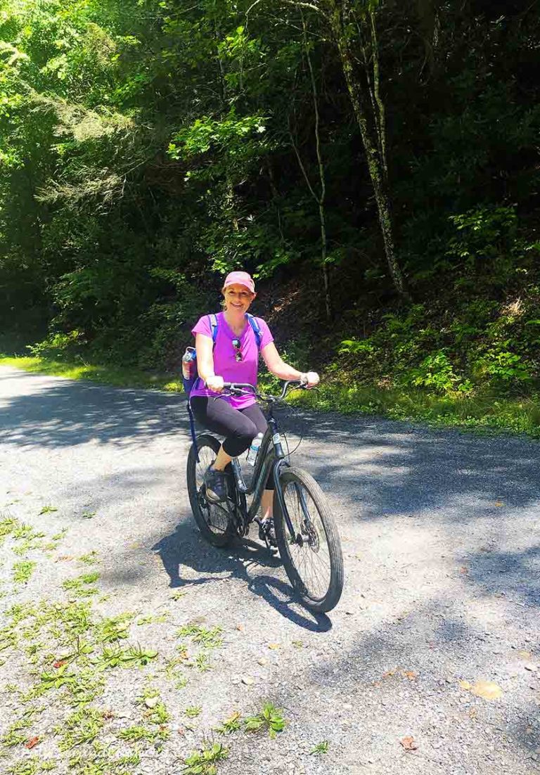 a woman riding a bicycle