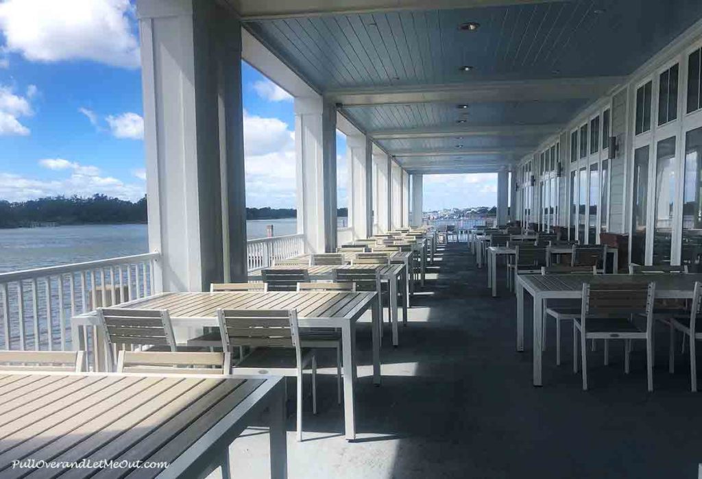 outdoor dining area overlooking water