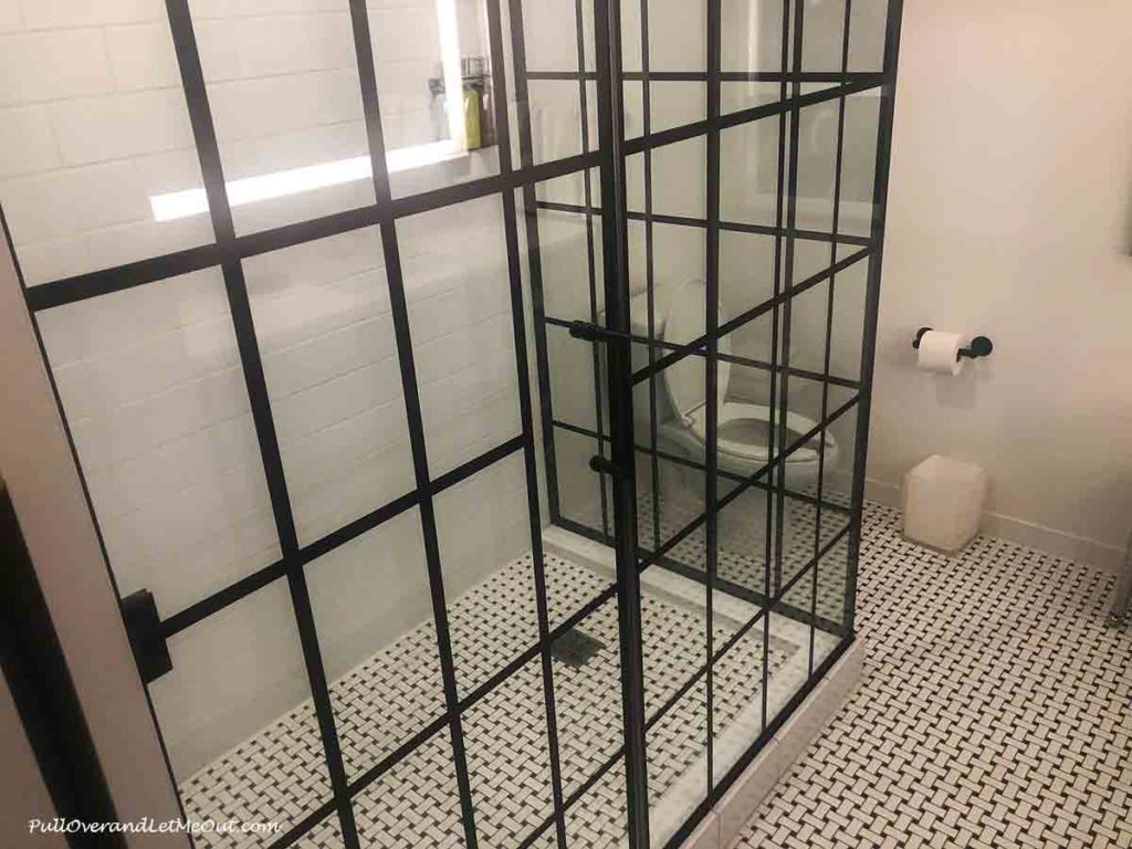 a spacious hotel shower