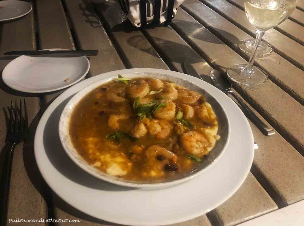 a bowl of shrimp and grits
