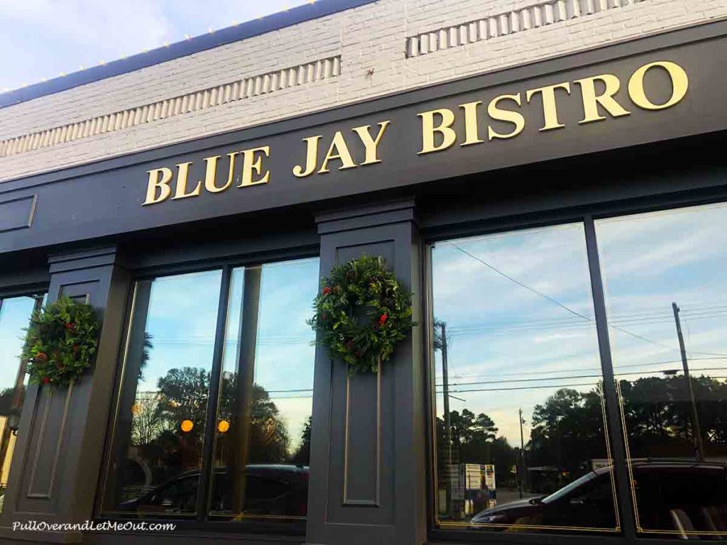 front window of a restaurant called Blue Jay Bistro