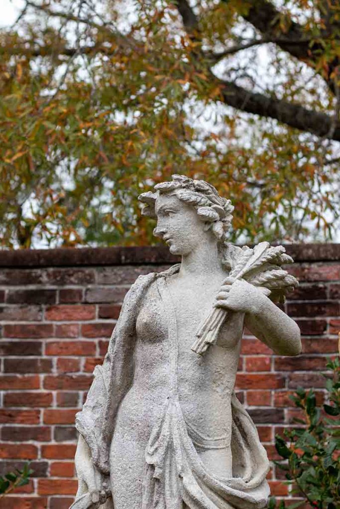 a cement garden statue