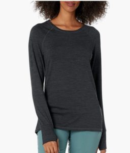 a woman in a long sleeve t shirt