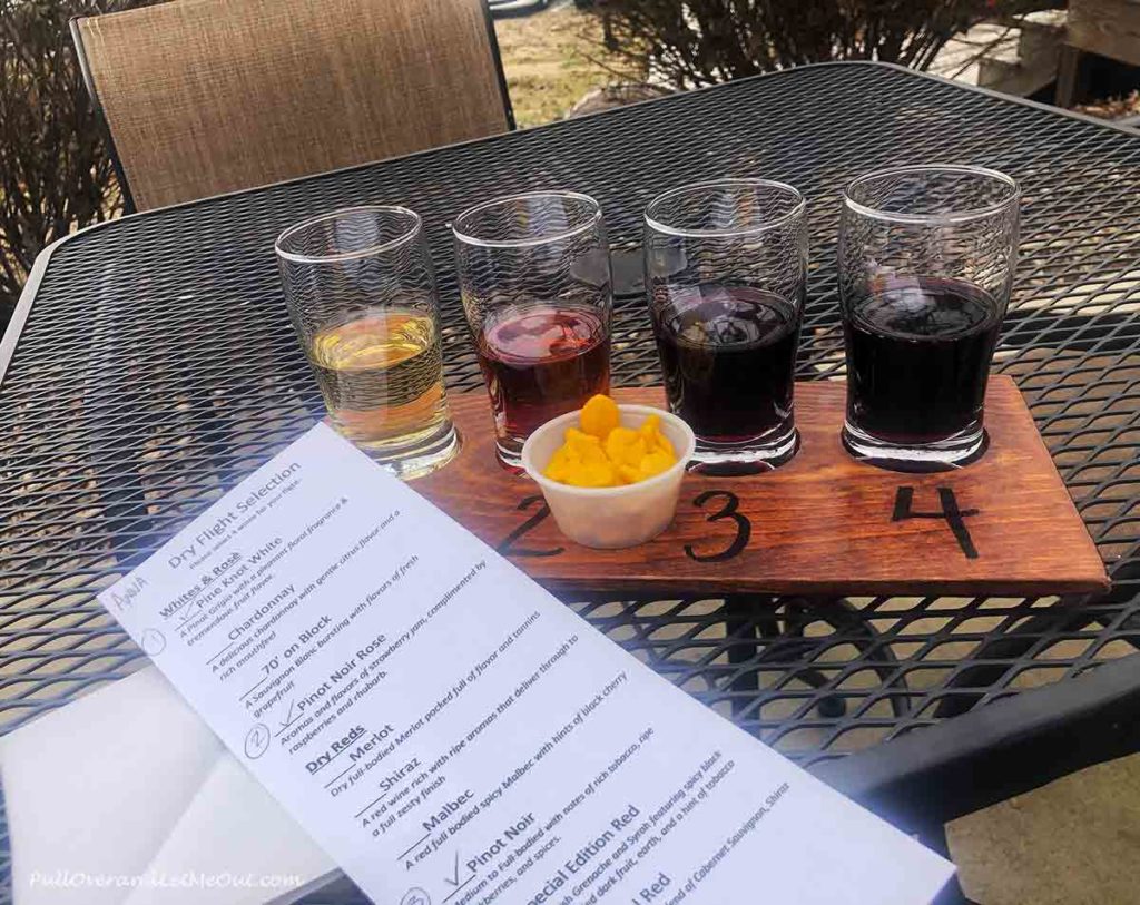 a flight of wine for sampling four differents wines.