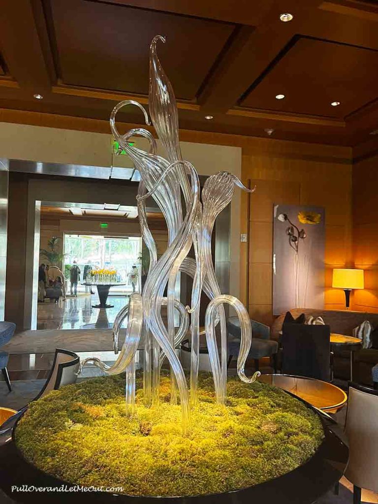 a Chihuly glass sculpture in a hotel lobby