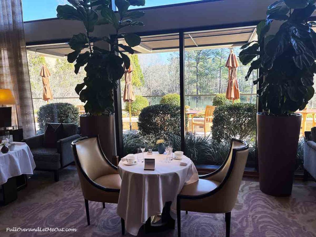 a table for two with a window view