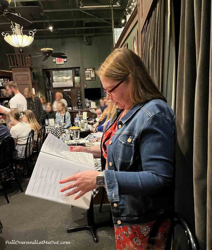 a woman reading a script