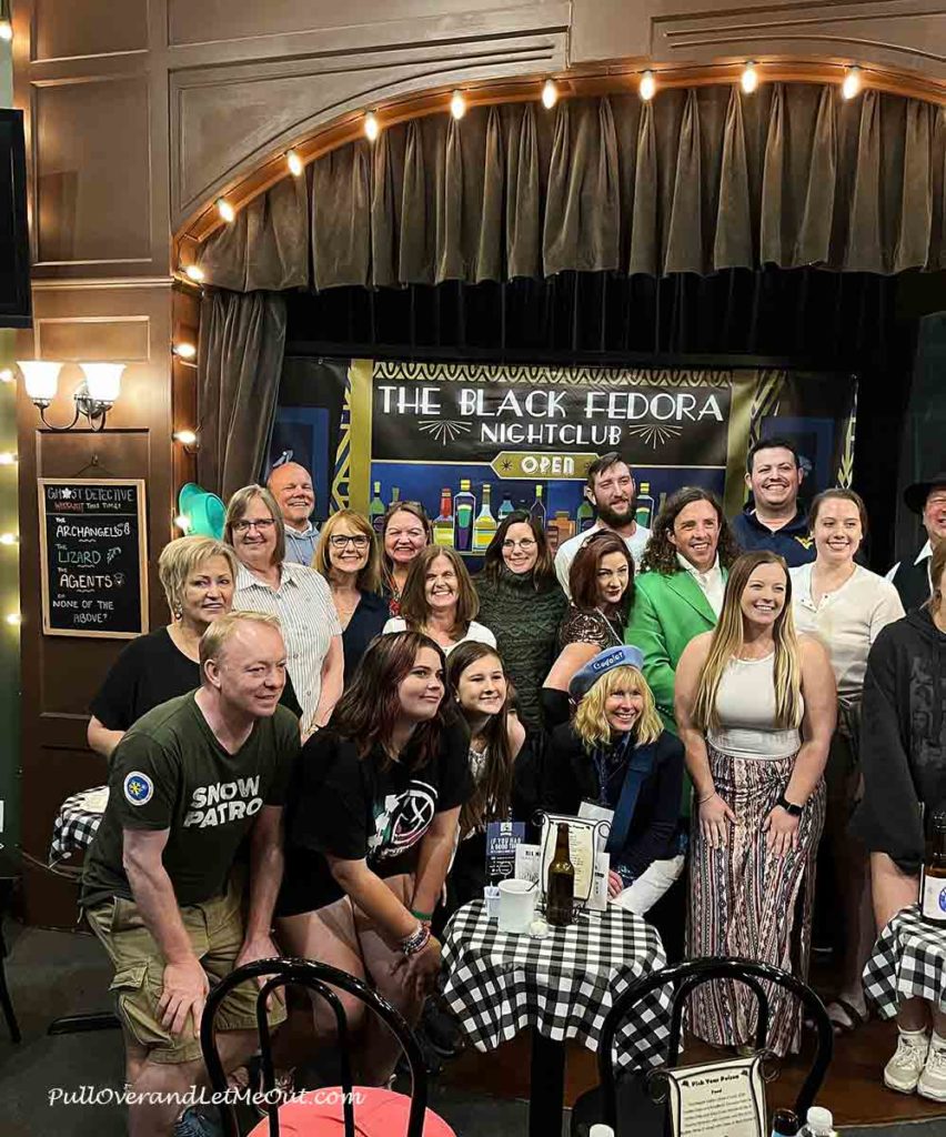 A cast picture at a theater