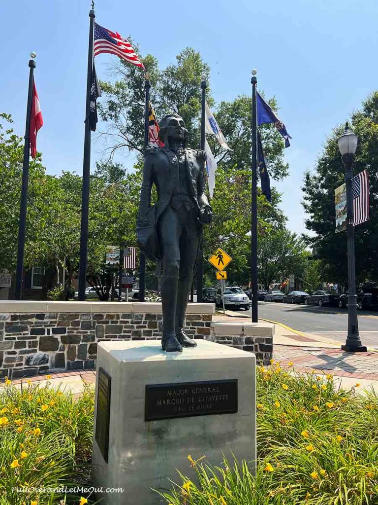 a brass statue of Lafayette