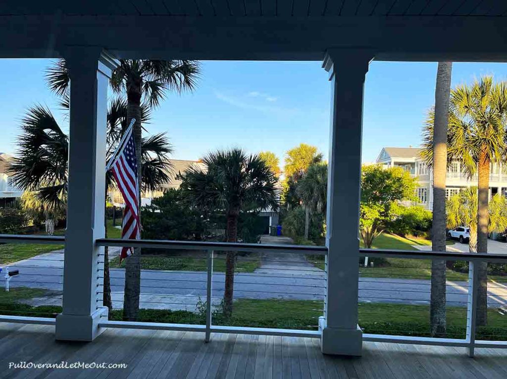 an American flag on a porch.