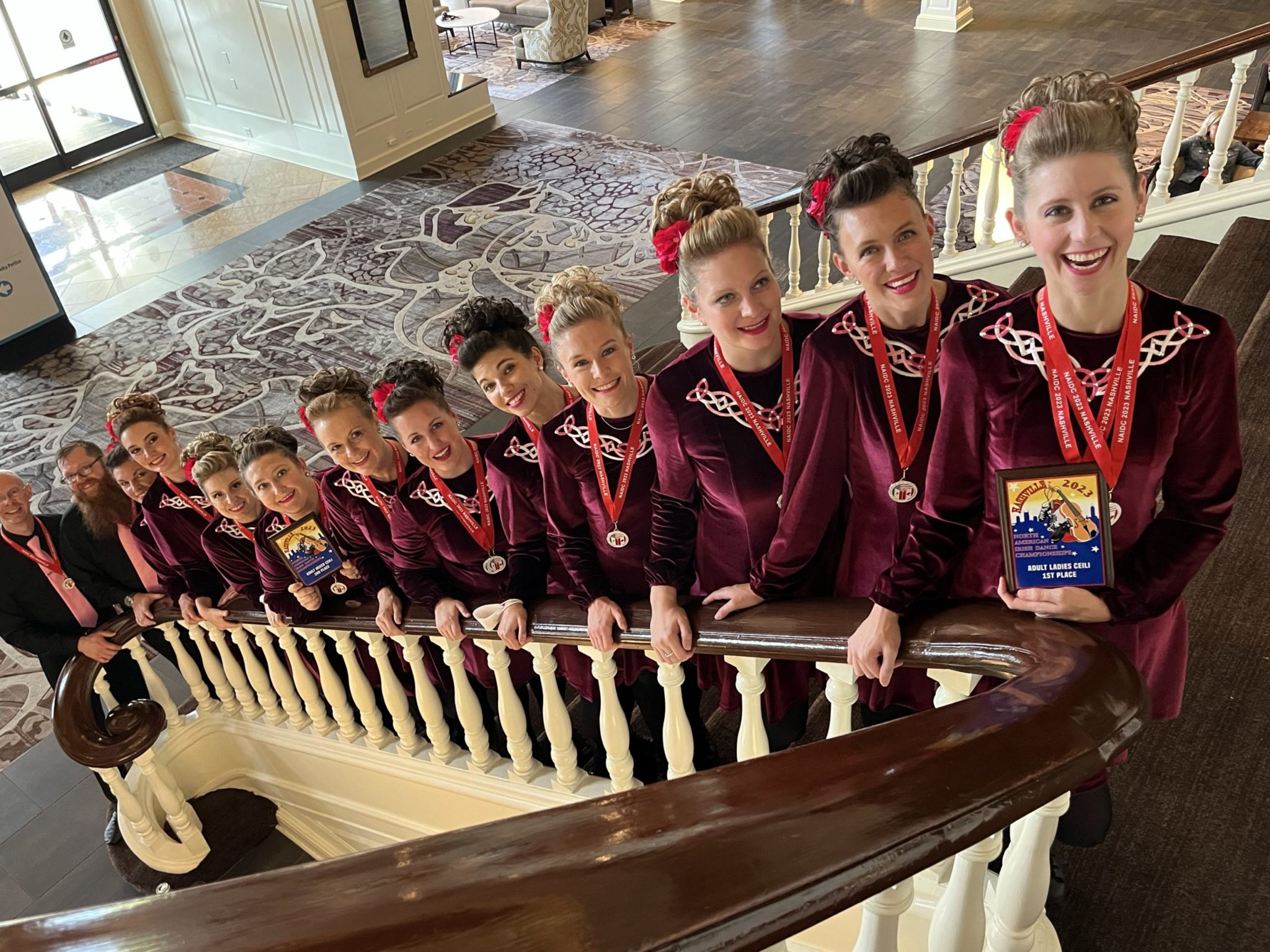Irish dancers posing on steps