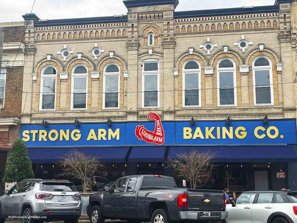 a building with a sign that says Strong Arm Baking Co.