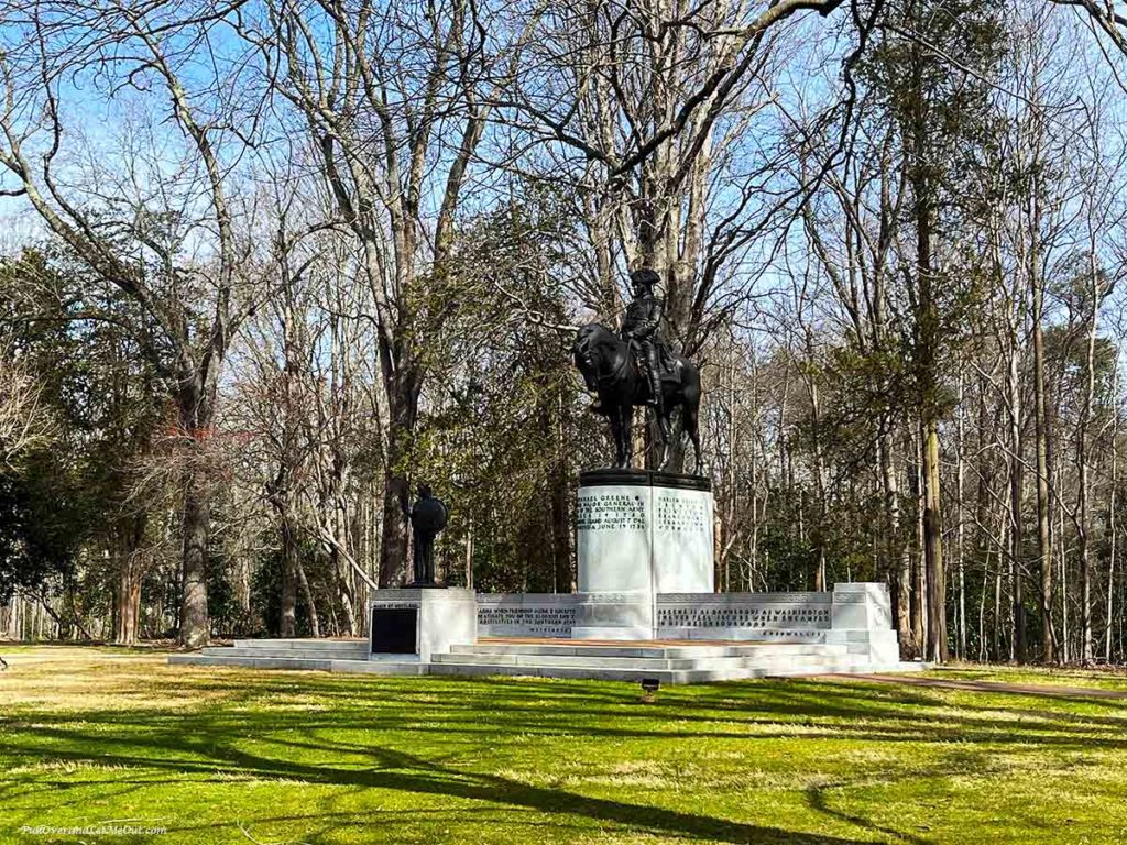A large statue of a soldier on a horse