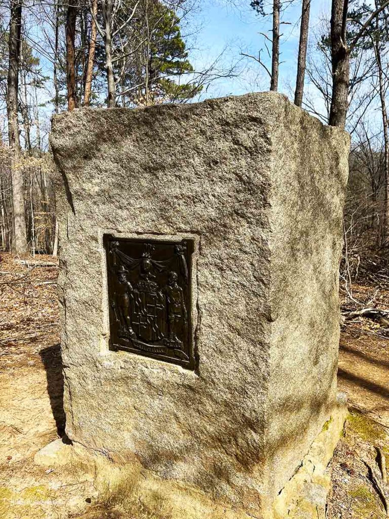 A stone memorial dedicated to fallen Revolutionary War soldiers from Maryland.
