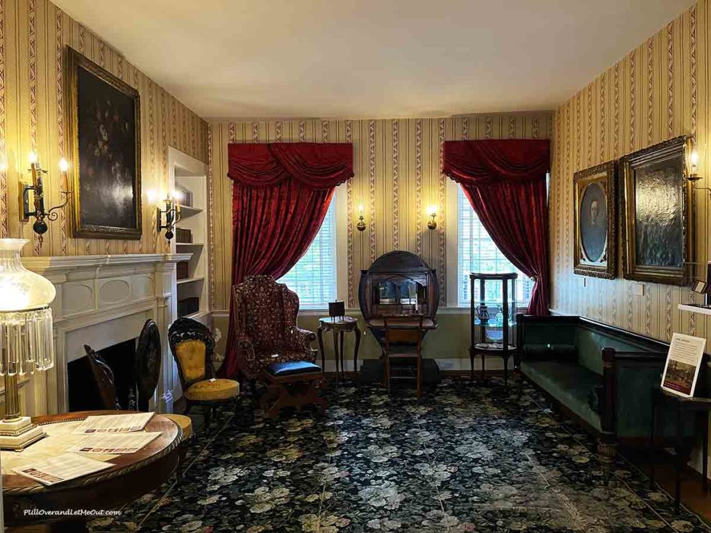 a parlor decorated as it would have been in the mid 19th century.