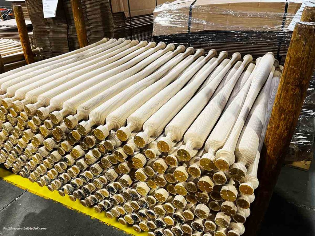 a stack of baseball bats