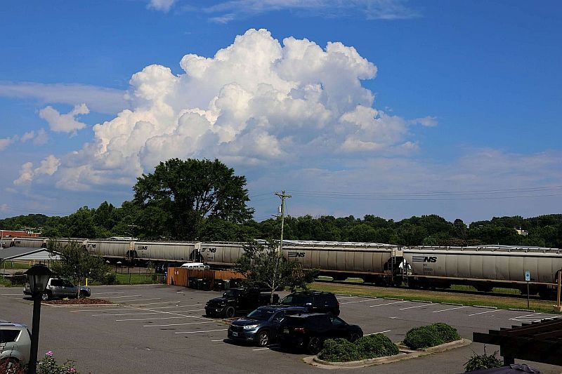 a row of railroad cars for grain