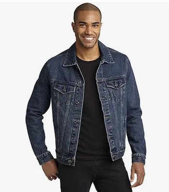 a man wearing a dark blue denim jacket