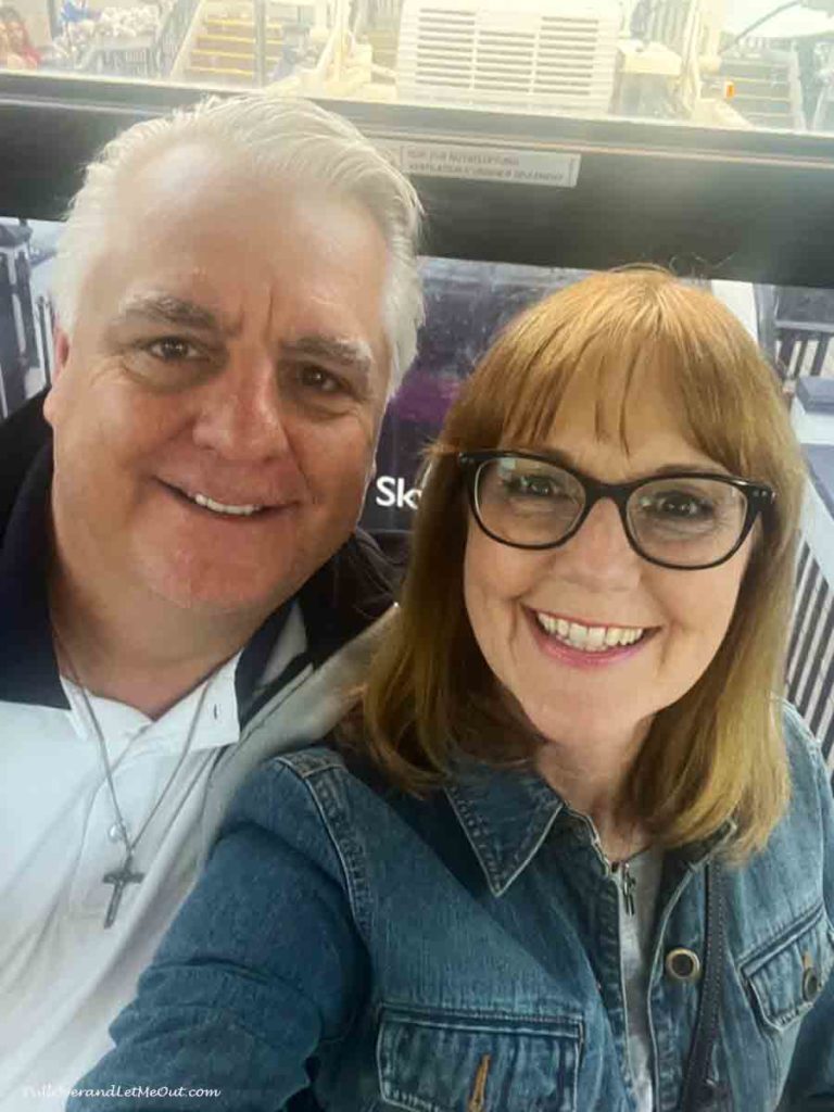 a man and a woman on a skywheel