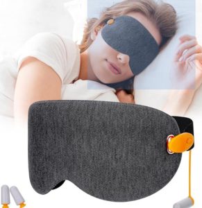 a woman wearing a sleep mask