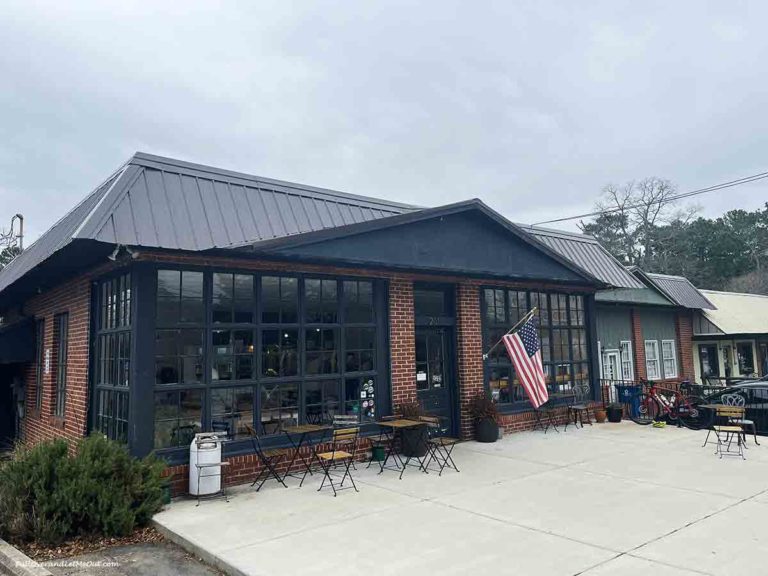 an American flag on the oustide of a coffee shop