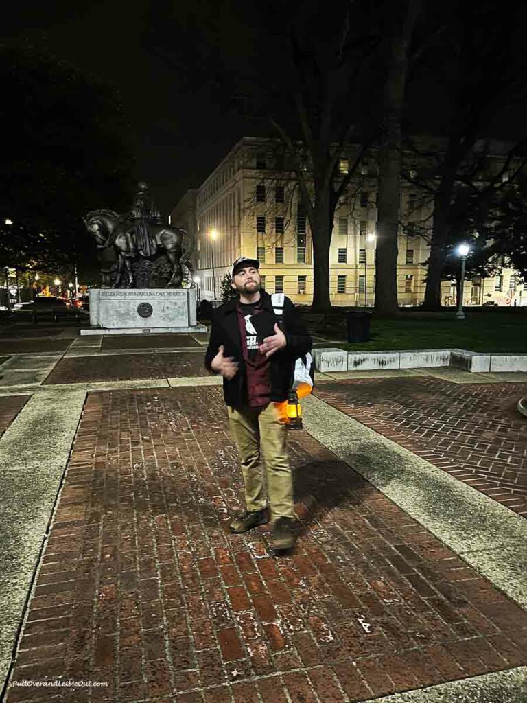 a ghost tour guide with a lantern