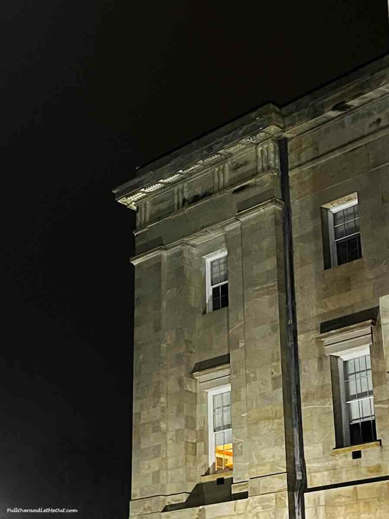 the third floor corner window of the NC Capitol